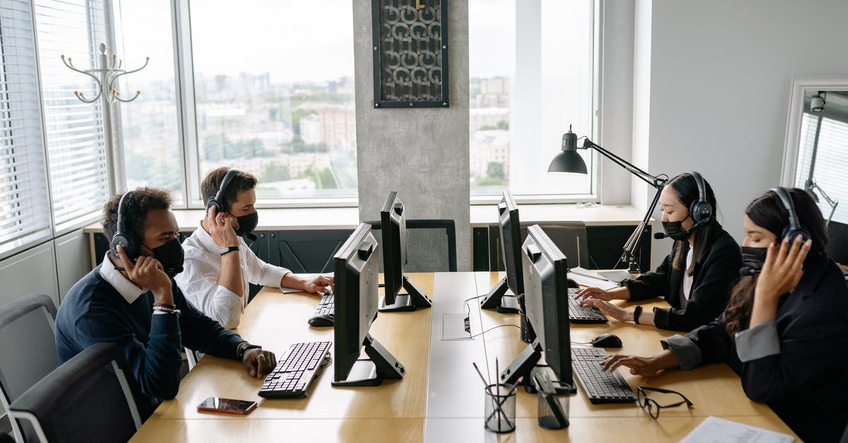 Brainwashed or sleeper agents - Group of Men and Women Working in the Office Brainwashed or sleeper agents - Group of Men and Women Working in the Office