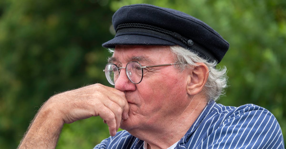 Breton resist magic cap in skyrim? - Elderly Man Wearing a Breton Cap Looking Afar