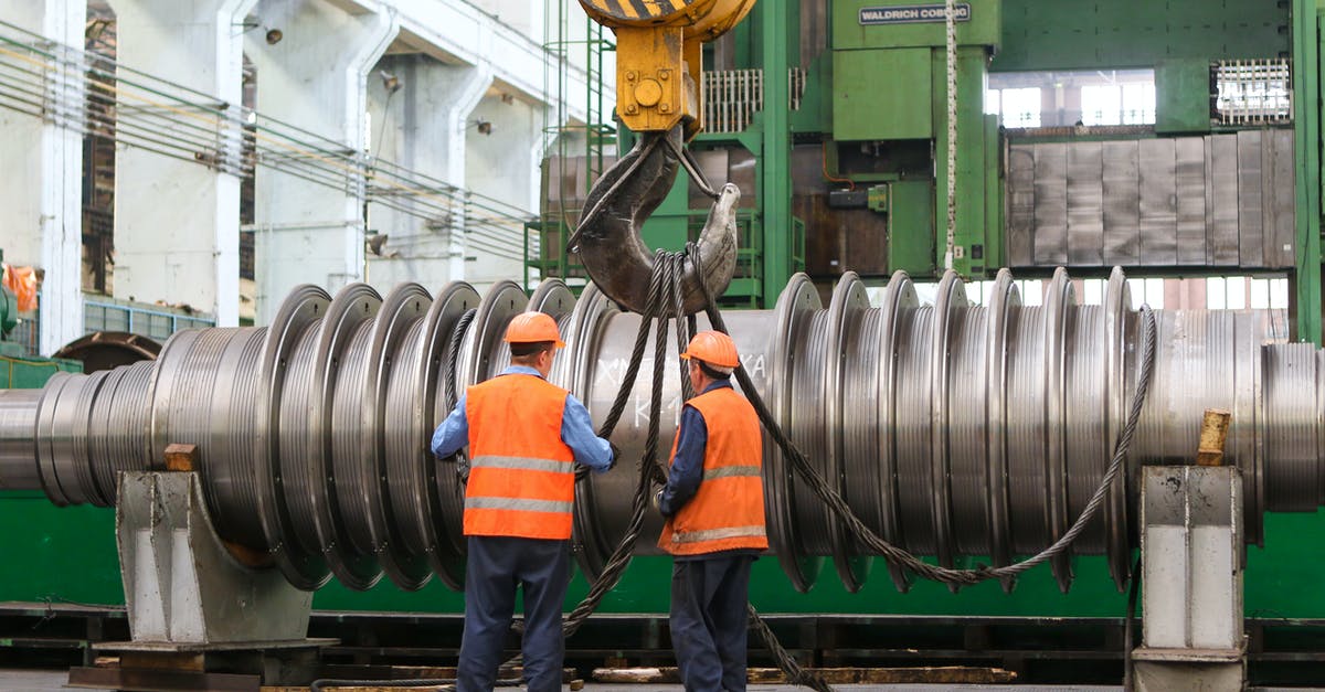 Brotherhood of Steel is now my enemy, what now? - Man in Blue Denim Jeans and Orange Hard Hat Standing Beside Green Metal Tank Brotherhood of Steel is now my enemy, what now? - Man in Blue Denim Jeans and Orange Hard Hat Standing Beside Green Metal Tank