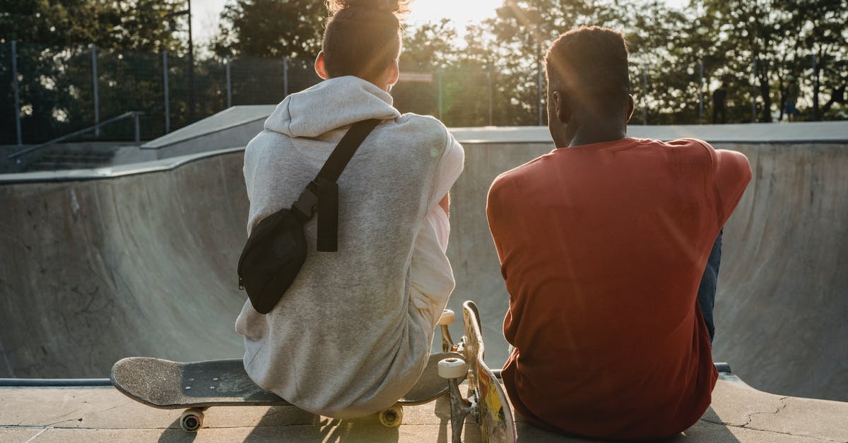 Caius Cosades won't talk to me - Diverse friends with skateboards on ramp