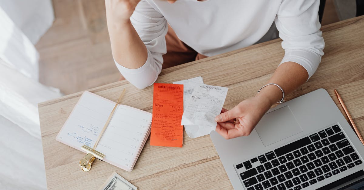 Calculating Pokémon IVs in Pokémon GO - Woman Sitting Behind the Desk and Looking at Receipts Calculating Pokémon IVs in Pokémon GO - Woman Sitting Behind the Desk and Looking at Receipts