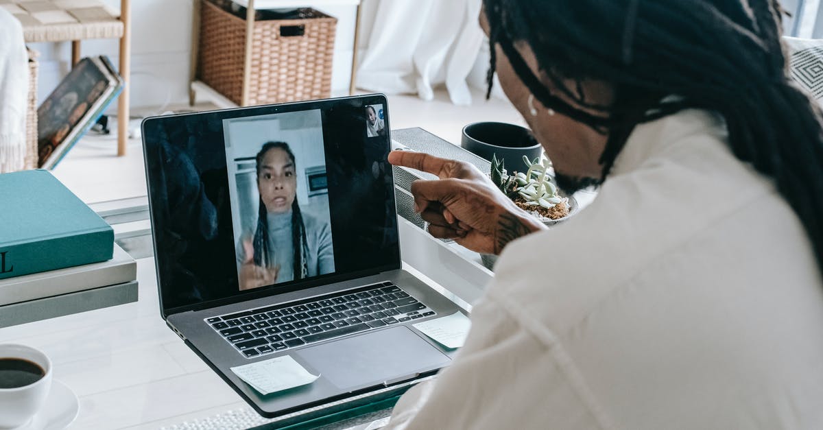 Call Of Duty 4 multiplayer issue - Stressed black couple having video call via laptop