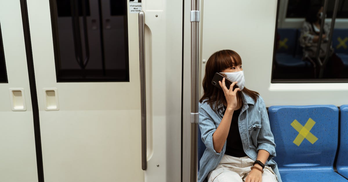 Call of Duty Advanced Warfare freezes about 2 minutes into Multiplayer gameplay - Woman Wearing a Face Mask and Talking on her Smartphone