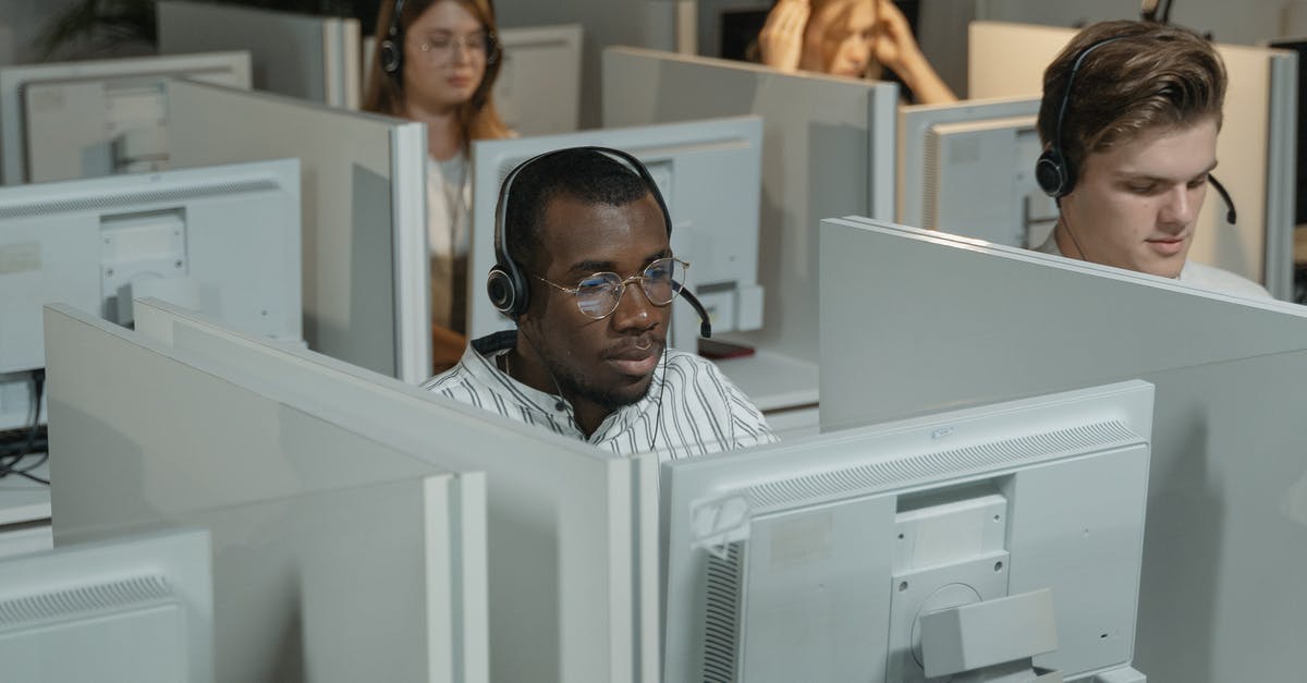 Call of Duty: Advanced Warfare keeps crashing - Man in Black Framed Eyeglasses Sitting Beside Woman in White Shirt Call of Duty: Advanced Warfare keeps crashing - Man in Black Framed Eyeglasses Sitting Beside Woman in White Shirt