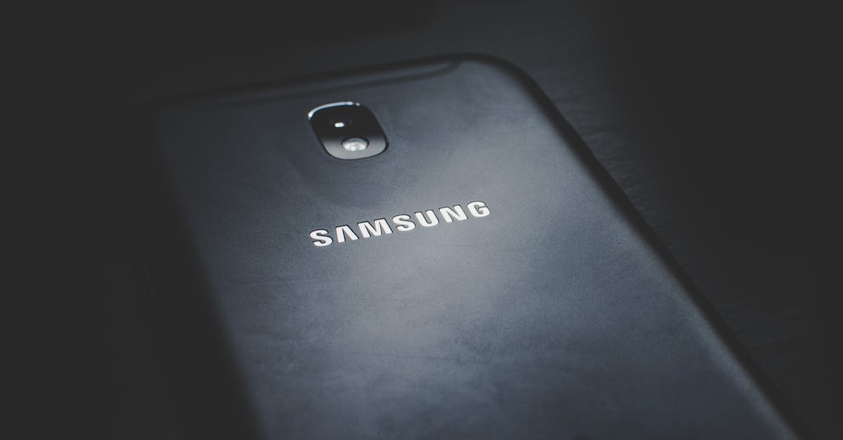Camera locks and can't be unlocked - Close-up Photo of Black Samsung Phone