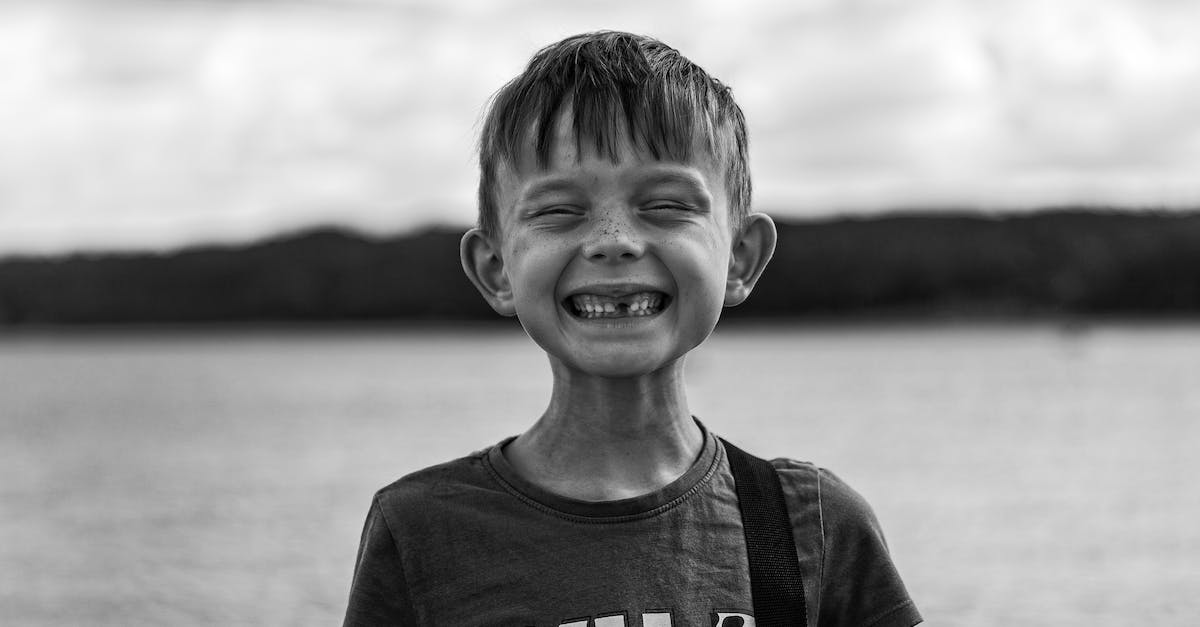 Can't Bribe Ultima Weapon? - Boy at Lake Smiling
