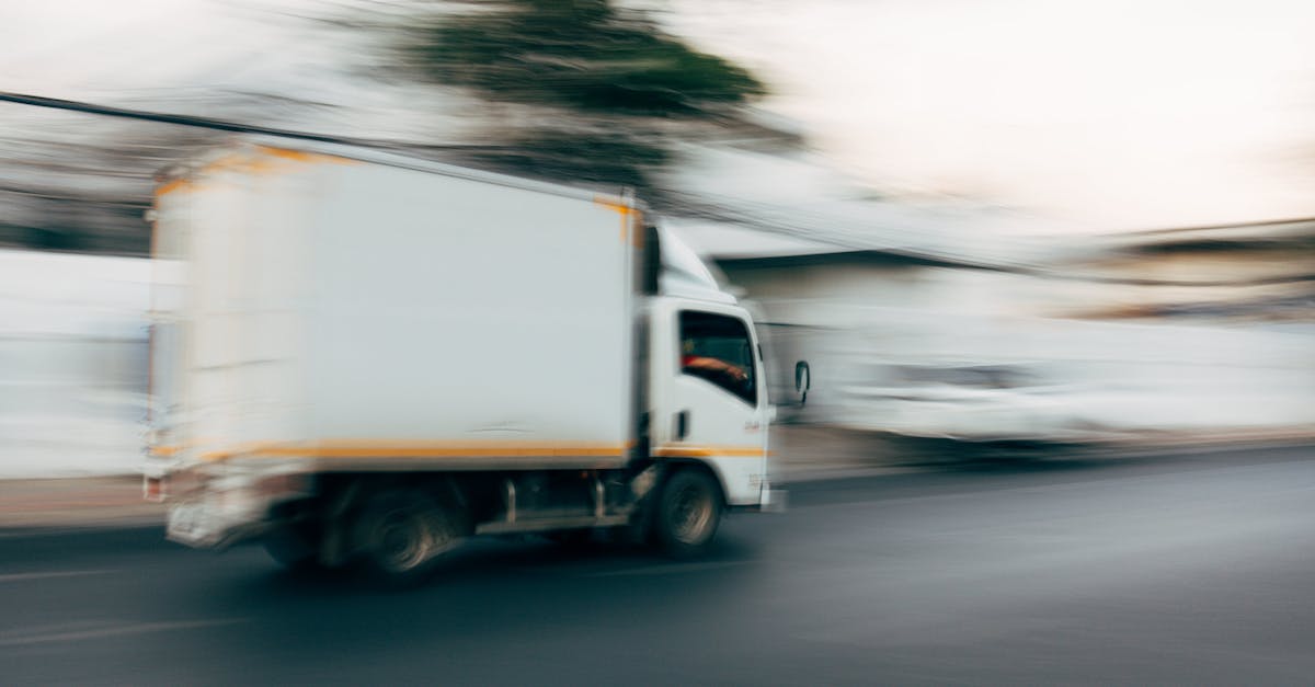 Can't click while moving - White and Brown Truck on Road