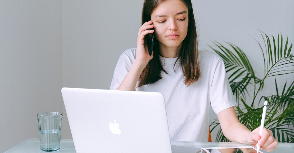 Can't connect to other Minecraft Game on ipad - Woman in White Crew Neck T-shirt Using Silver Macbook