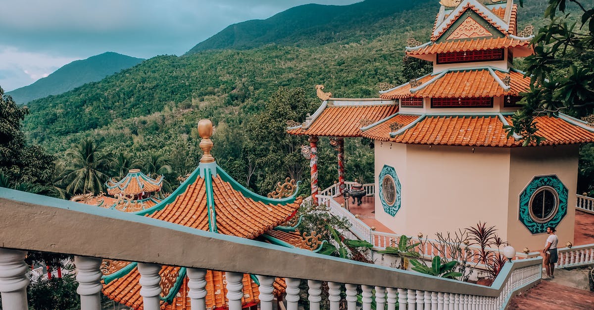 Can't Find Jungle Temple in Terraria 1.2 - High angle of traditional oriental shrine located in calm green park with tropical palms and tourist at distance Can't Find Jungle Temple in Terraria 1.2 - High angle of traditional oriental shrine located in calm green park with tropical palms and tourist at distance