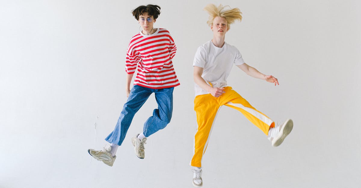 Can't make diagonal jump in "I Wanna Kill The Kamilia 2" - Full body cheerful teenager friends in colorful wear jumping high on white background and looking at camera Can't make diagonal jump in "I Wanna Kill The Kamilia 2" - Full body cheerful teenager friends in colorful wear jumping high on white background and looking at camera