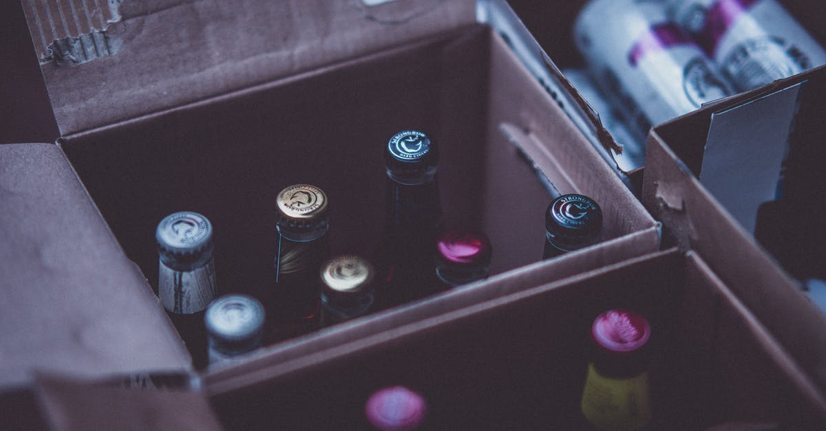 Can't open upgrades menu in MvM - Glass Bottles on Boxes Close-up Photography