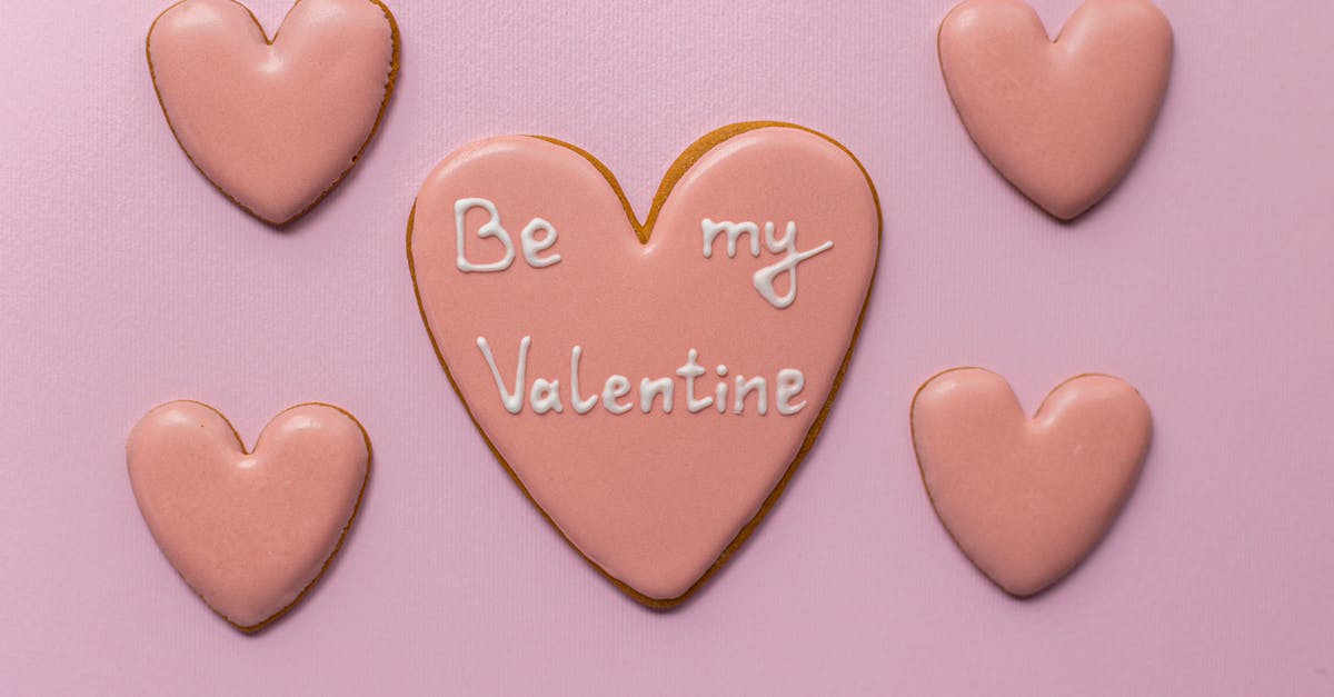 can't remember my pass word for my account [duplicate] - Top view of sweet heart shaped cookies saying Be My Valentine on pink background