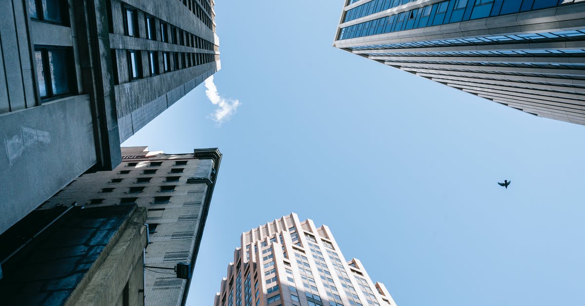 Can't restore my progress on Tiny Tower - From below of contemporary multistage commerce buildings located in megalopolis against cloudless blue sky Can't restore my progress on Tiny Tower - From below of contemporary multistage commerce buildings located in megalopolis against cloudless blue sky
