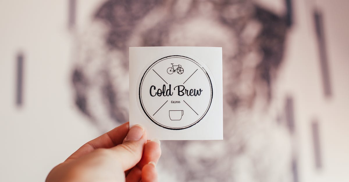 Can a contract be written that unlocks parts? - Unrecognizable person demonstrating coffee shop badge with Cold Brew inscription and creative design in hand while standing on blurred background Can a contract be written that unlocks parts? - Unrecognizable person demonstrating coffee shop badge with Cold Brew inscription and creative design in hand while standing on blurred background