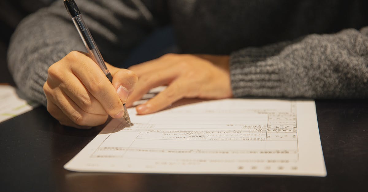 Can a contract be written that unlocks parts? - Man filling in form on parer at table Can a contract be written that unlocks parts? - Man filling in form on parer at table