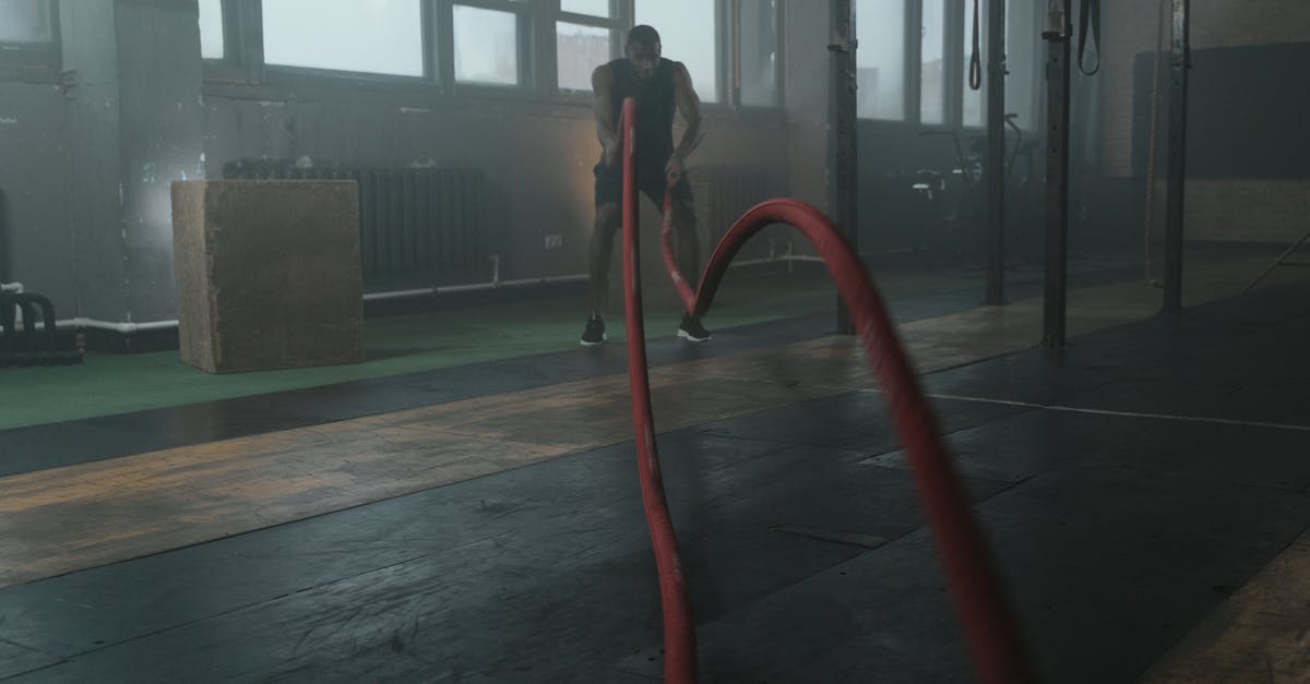 Can a gym get free without battling? - Woman in Black Jacket Standing on Brown Wooden Floor Can a gym get free without battling? - Woman in Black Jacket Standing on Brown Wooden Floor