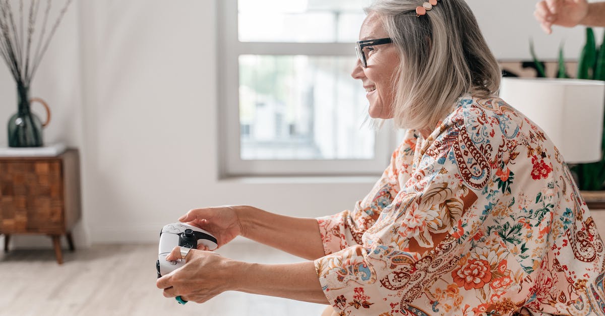 Can a Playstation 4 be used simultaneously while remote playing with a Vita? - An Elderly Woman Playing a Video Game 