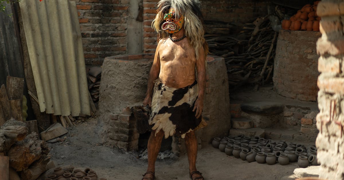 Can a Sith Warrior or Inquisitor wear the Mask of Revan? - Woman in Brown Dress Standing Beside Brown Brick Wall