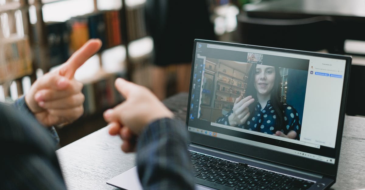 Can allies I've muted see my chat messages? - Young lady learning sign language during online lesson with female tutor Can allies I've muted see my chat messages? - Young lady learning sign language during online lesson with female tutor
