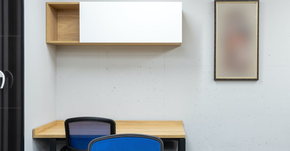 Can an item frame that opens a door close it immediately after? - Interior of office with tables and chairs