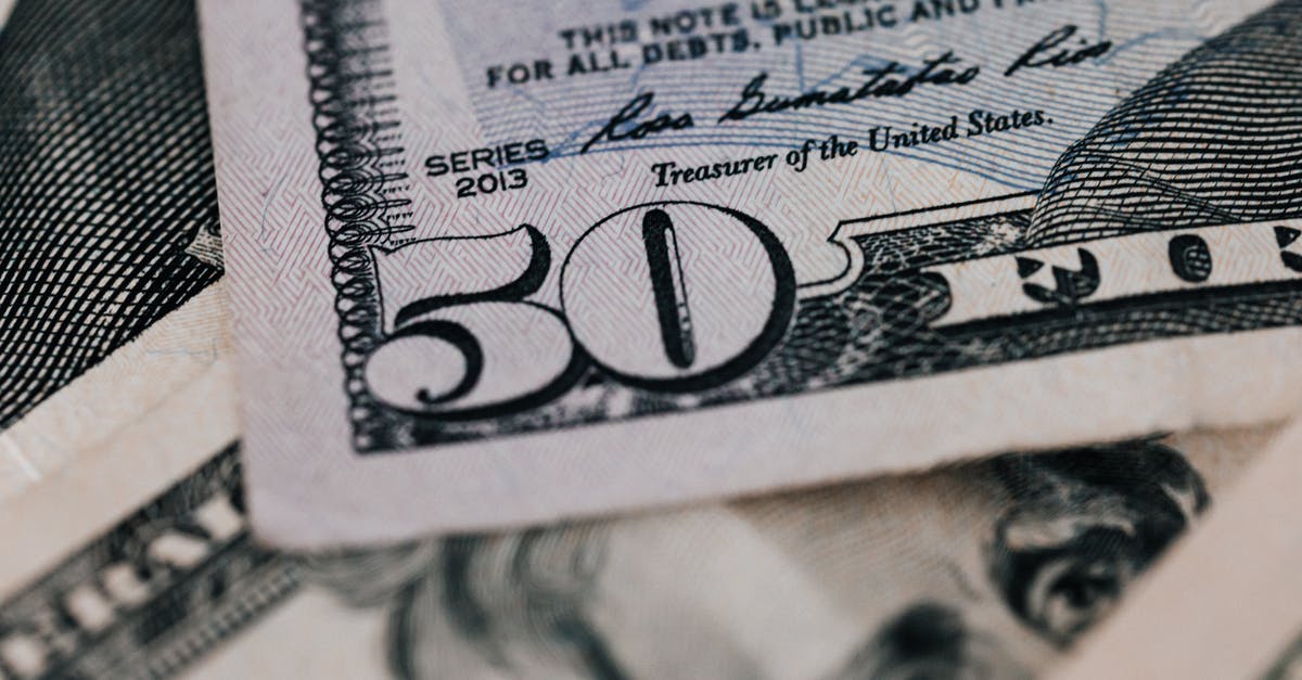 Can an official N64 Rumble Pak be soldered to work without a battery? [closed] - From above closeup of American dollar banknote with signature and printed words above paper money