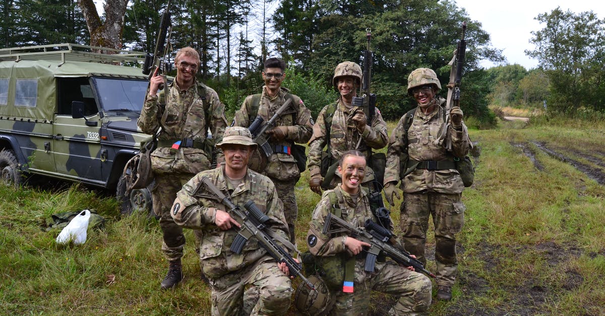 Can Army Helmets be modified? If yes, how? - A Group of Smiling Soldiers with Rifles Can Army Helmets be modified? If yes, how? - A Group of Smiling Soldiers with Rifles
