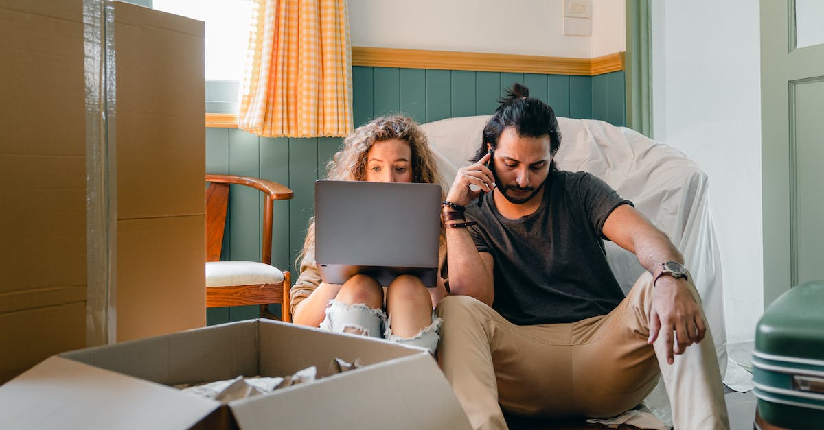 Can chat be disabled when watching a Heroes of the Storm replay? - Concentrated couple using laptop and talking on smartphone Can chat be disabled when watching a Heroes of the Storm replay? - Concentrated couple using laptop and talking on smartphone