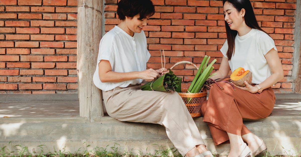 Can Dragonrot kill/incapacitate some NPCs making some interactions impossible after a bunch of deaths? - Cheerful Asian girlfriends tying bundle of fresh herbs on pavement