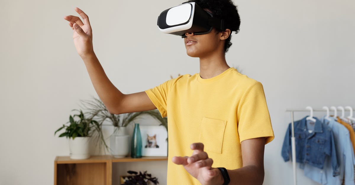 Can FIFA be played cross-console online? [duplicate] - Boy in Yellow Crew Neck T-shirt Wearing White and Black Vr Goggles