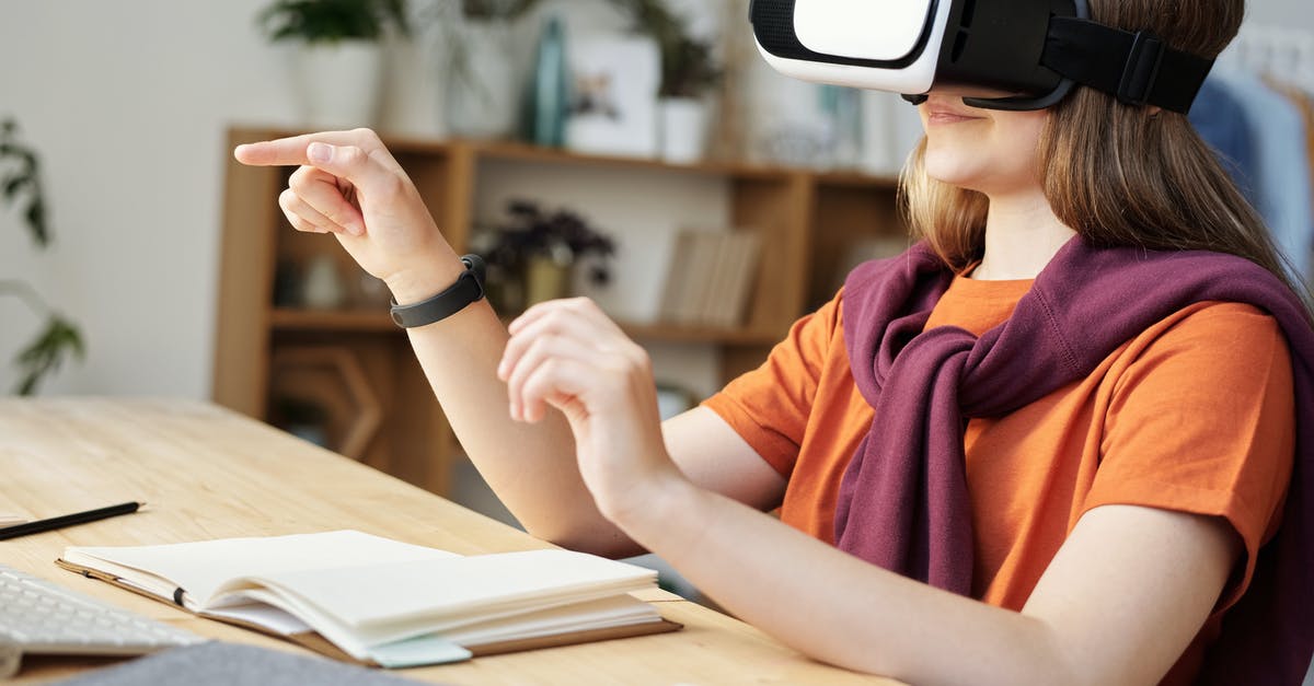 Can FIFA be played cross-console online? [duplicate] - Girl Wearing Black and White Vr Goggles