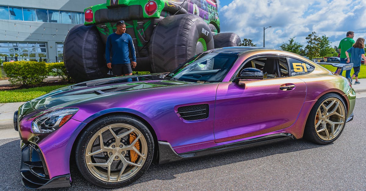 Can gang power go lower than 4%? - Purple Porsche 911 Parked in Front of Man in Black Jacket