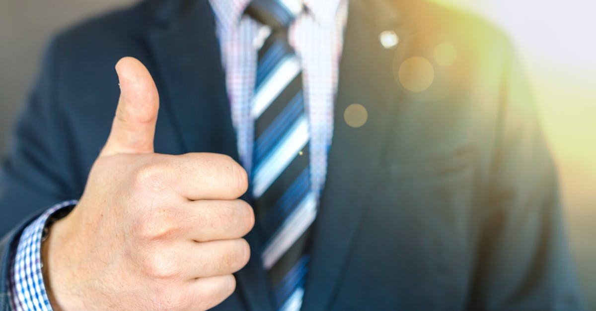 Can I activate 2 Lucky-Eggs at the same time? If yes, is it working like x4 XP or what? - Close-up Photo of Man Wearing Black Suit Jacket Doing Thumbs Up Gesture
