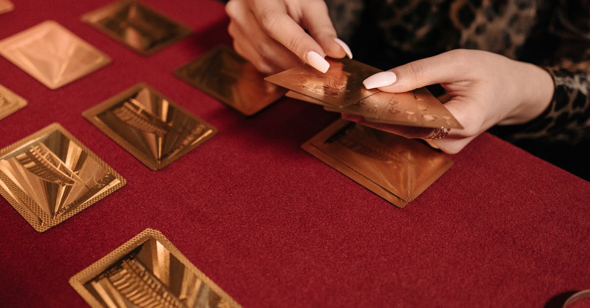 Can I add multiple xbox live gold cards to my account? [duplicate] - A Woman Playing with Gold Colored Cards