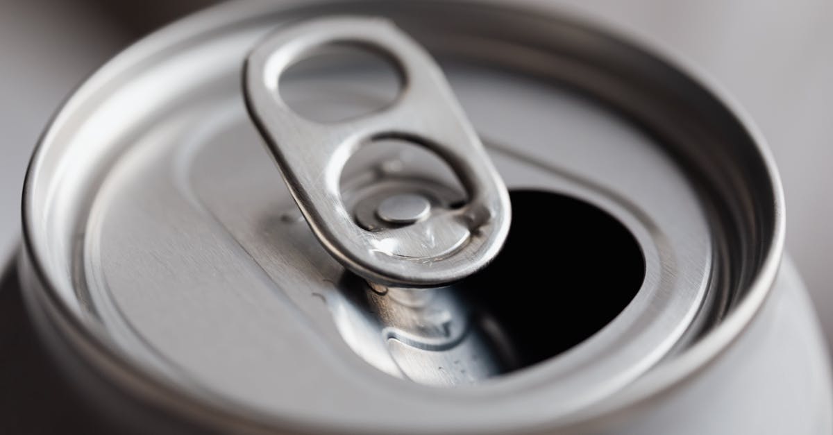 Can I ban players from my party? - Open grey metal soda can