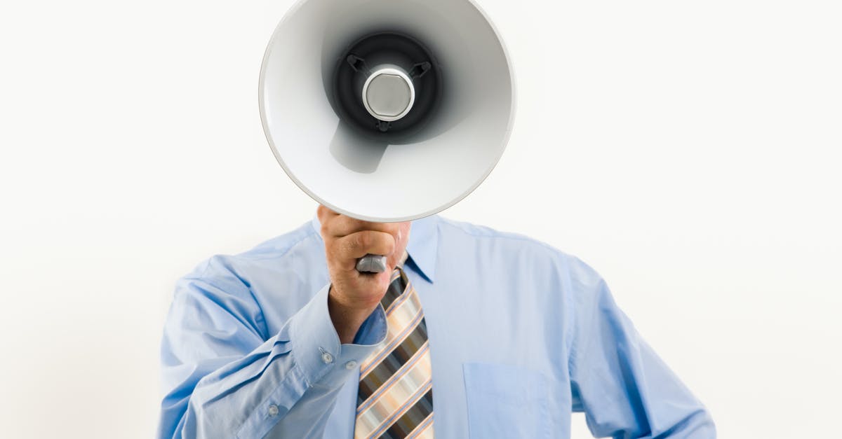 Can I bind a key to specific voice commands? - Man Holding a Megaphone
