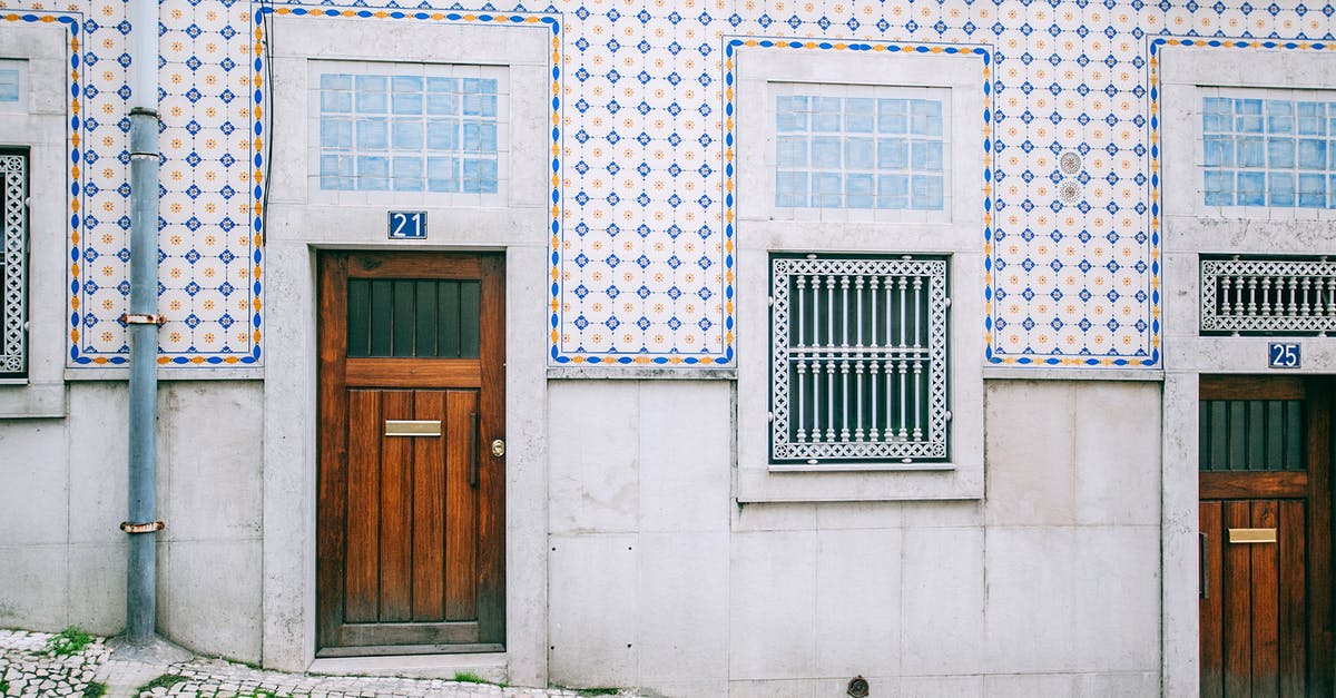 Can I block creation of new Nether Portals in vanilla Minecraft? - Facade of modern residential building with wooden doors and ornamental tiled walls in daylight Can I block creation of new Nether Portals in vanilla Minecraft? - Facade of modern residential building with wooden doors and ornamental tiled walls in daylight