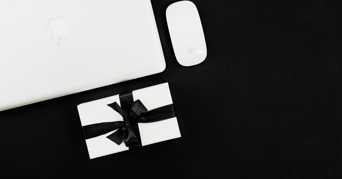 Can I change the color of a cosmetic I buy off the Community Market? - White Apple Magic Mouse Beside Silver Macbook On Black Background Can I change the color of a cosmetic I buy off the Community Market? - White Apple Magic Mouse Beside Silver Macbook On Black Background