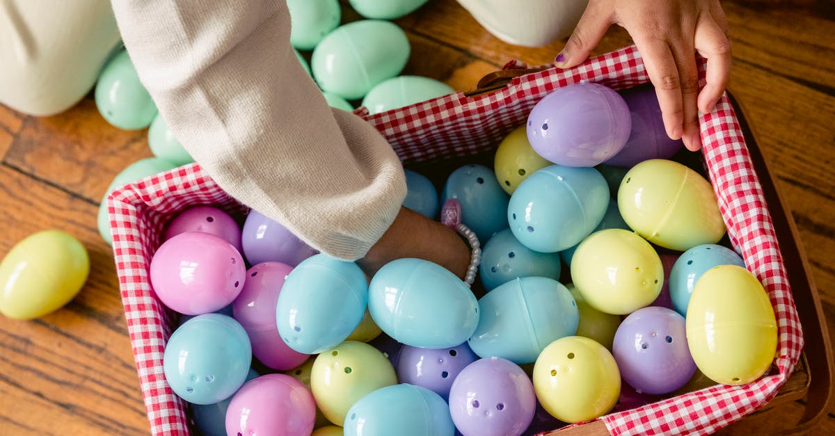 Can I choose which Zeds I play as? - Unrecognizable little girl playing with artificial colorful Easter eggs Can I choose which Zeds I play as? - Unrecognizable little girl playing with artificial colorful Easter eggs