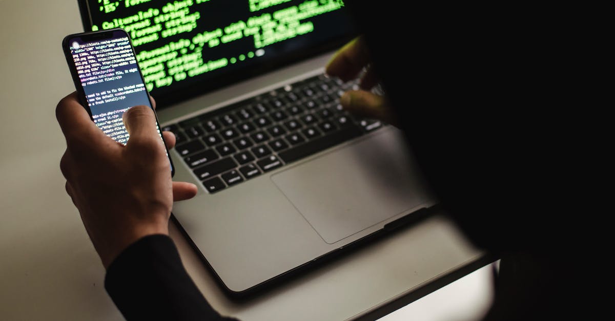 Can I convert a game code from one PC platform to another? - Crop unrecognizable developer using laptop and smartphone Can I convert a game code from one PC platform to another? - Crop unrecognizable developer using laptop and smartphone