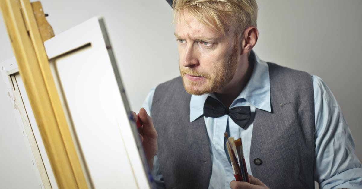 Can I copy my Master League file to another computer? - Concentrated male artist painting on canvas in studio Can I copy my Master League file to another computer? - Concentrated male artist painting on canvas in studio