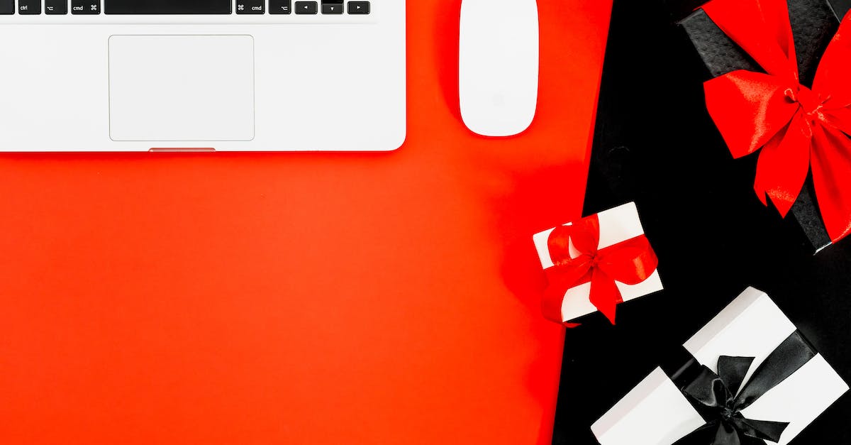 Can I copy Steam game files from a Mac onto a PC? - Macbook Pro And Gift Boxes On Red And Black Background Can I copy Steam game files from a Mac onto a PC? - Macbook Pro And Gift Boxes On Red And Black Background