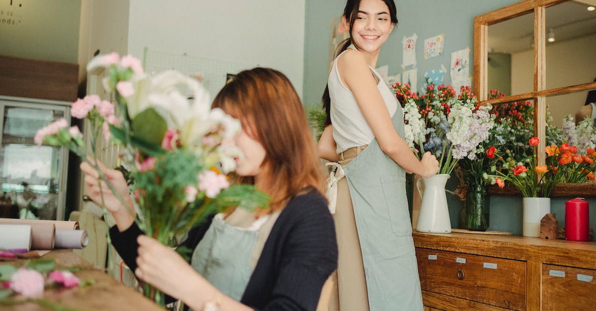 Can I craft Sapphire Staff in Terraria on Android? - Cheerful florist preparing floral decoration in vase in workshop