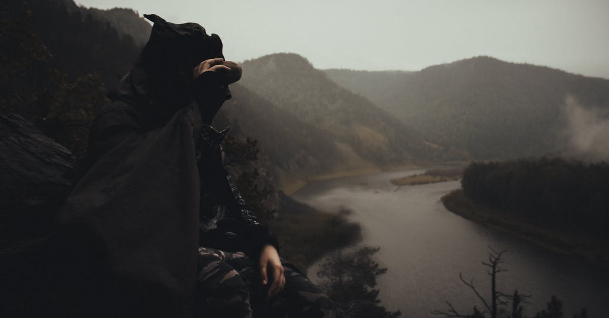 Can I deplete an area of Pokemon? - Man Wearing a Raincoat Sitting on Mountain Area Can I deplete an area of Pokemon? - Man Wearing a Raincoat Sitting on Mountain Area