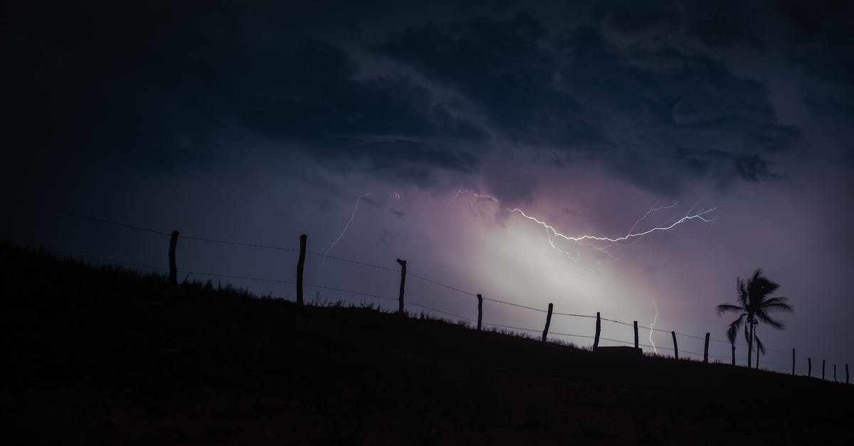 Can I destroy these adjacent Air Defenses with my Lightning Spells? - Silhouette of Coconut Tree Under Clouds With Lightning