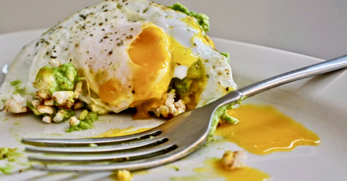 Can I determine the quality of an egg before picking it up? - Avocado with Fried Egg with Runny Yolk 