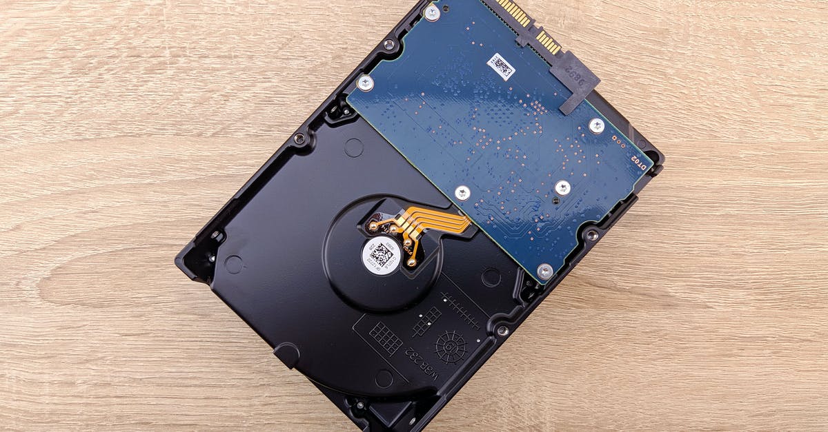 Can I divide into 2 partitions of 2TB, a 4TB HDD into only 1 HDD for a Wii U? - Hard drive placed on wooden table Can I divide into 2 partitions of 2TB, a 4TB HDD into only 1 HDD for a Wii U? - Hard drive placed on wooden table