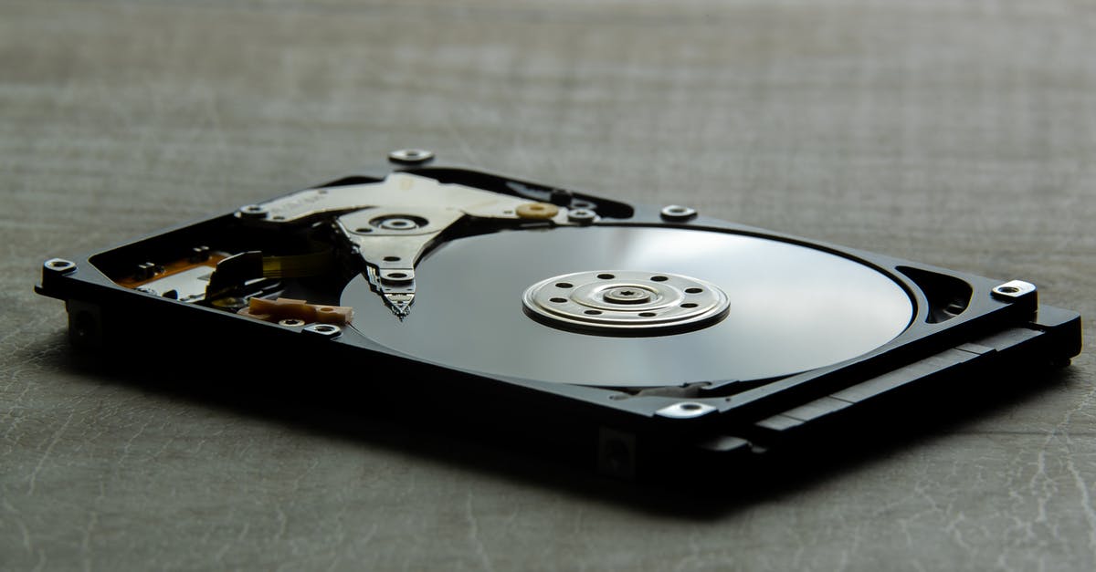 Can I divide into 2 partitions of 2TB, a 4TB HDD into only 1 HDD for a Wii U? - Computer Hard Drive Laid on Gray surface Can I divide into 2 partitions of 2TB, a 4TB HDD into only 1 HDD for a Wii U? - Computer Hard Drive Laid on Gray surface