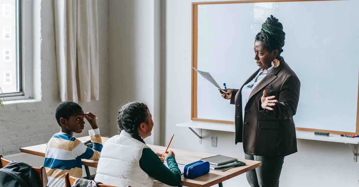 Can I do a Deep Rock Galactic promotion assignment on a different class than the one I am promoting? - Adult African American female teacher in formal suit standing near whiteboard and explaining new material to multiethnic elementary pupils in light classroom Can I do a Deep Rock Galactic promotion assignment on a different class than the one I am promoting? - Adult African American female teacher in formal suit standing near whiteboard and explaining new material to multiethnic elementary pupils in light classroom