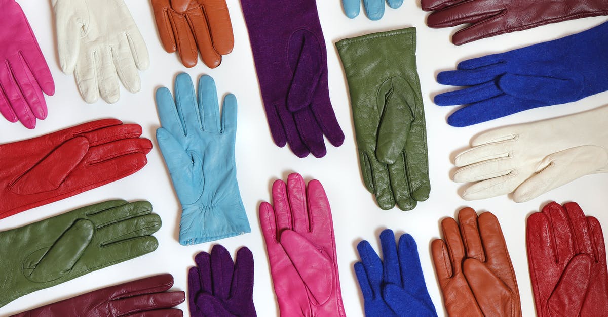 Can I enchant my leather gloves again? - Assorted Color Gloves on White Surface