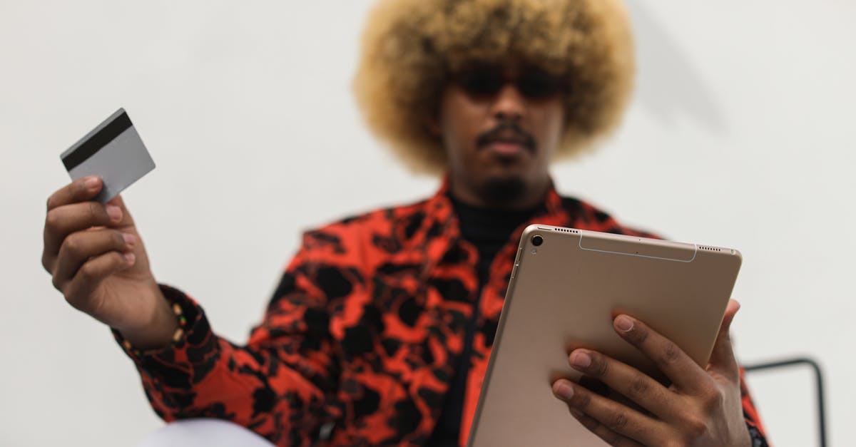 Can I get minecraft pe back after buying it but losing the tablet that I bought it on? - A Man Looking at His Tablet 